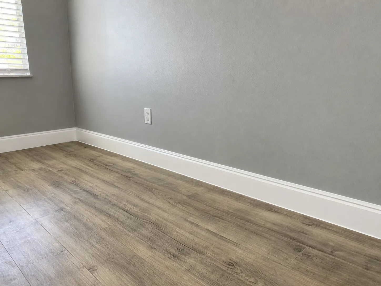 Fresh interior paint and white baseboards
