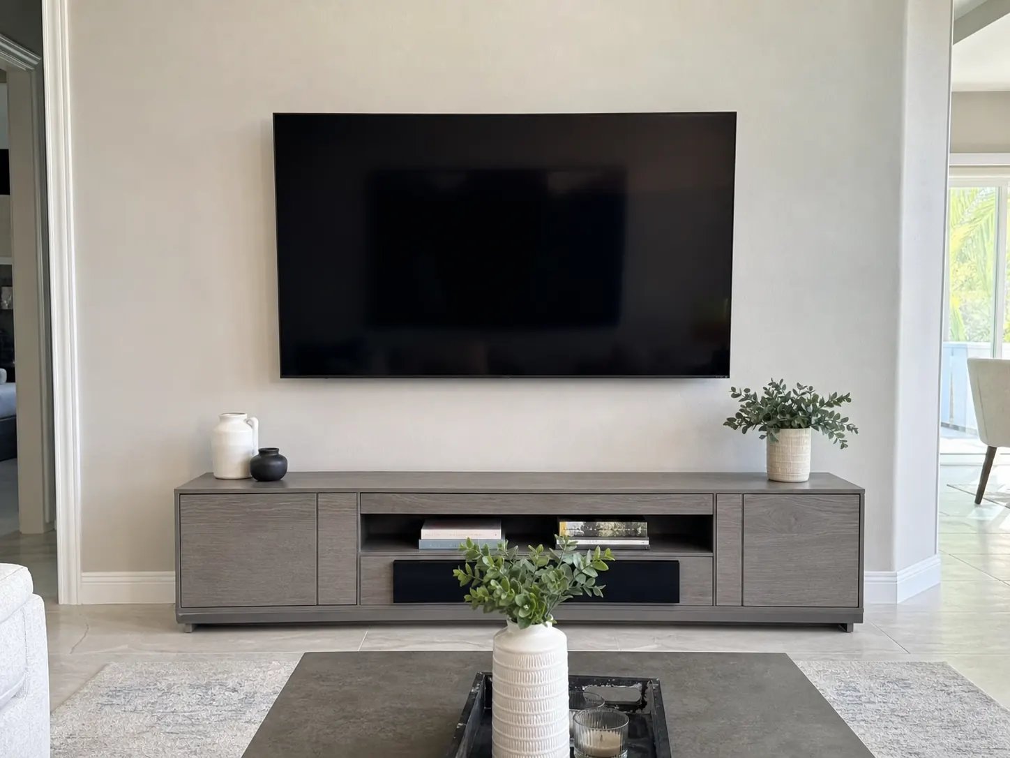 Television mounted neatly with hidden cables