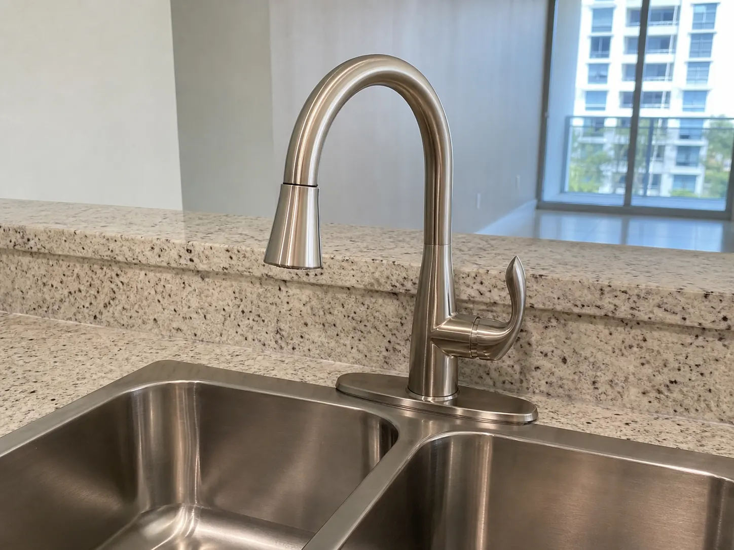 New brushed metal kitchen faucet